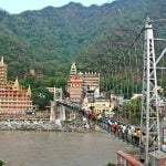 Lakshman Jhula, the famous hanging bridge across Ganga, is about 3 km from the main township of Rishikesh