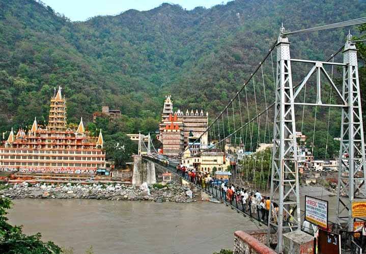 Lakshman Jhula, the famous hanging bridge across Ganga, is about 3 km from the main township of Rishikesh